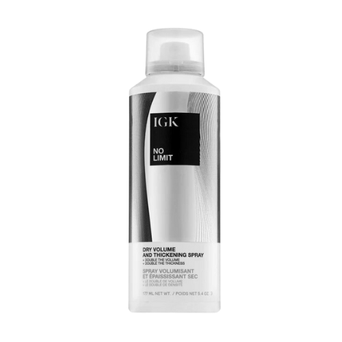 Hair volume and thickening spray bottle with black and white design.
