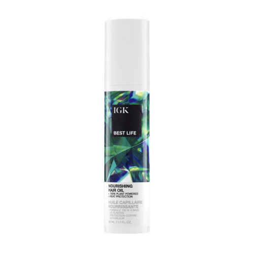 Bottle of IGK Best Life Nourishing Hair Oil with vibrant abstract design.