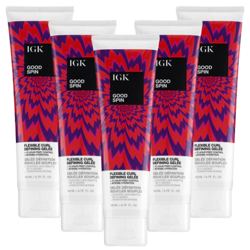 Six tubes of IGK Good Spin curl defining gelée with colorful packaging.