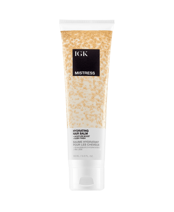 Tube of IGK Mistress Hydrating Hair Balm on a white background.