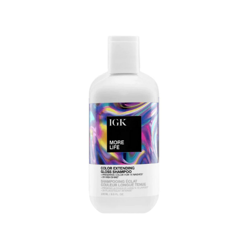 Bottle of IGK More Life color-extending gloss shampoo.